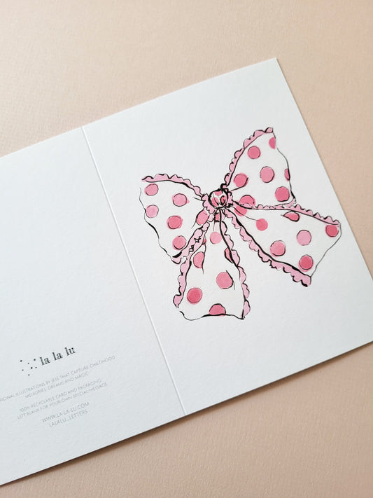 Pink polka dot bow
